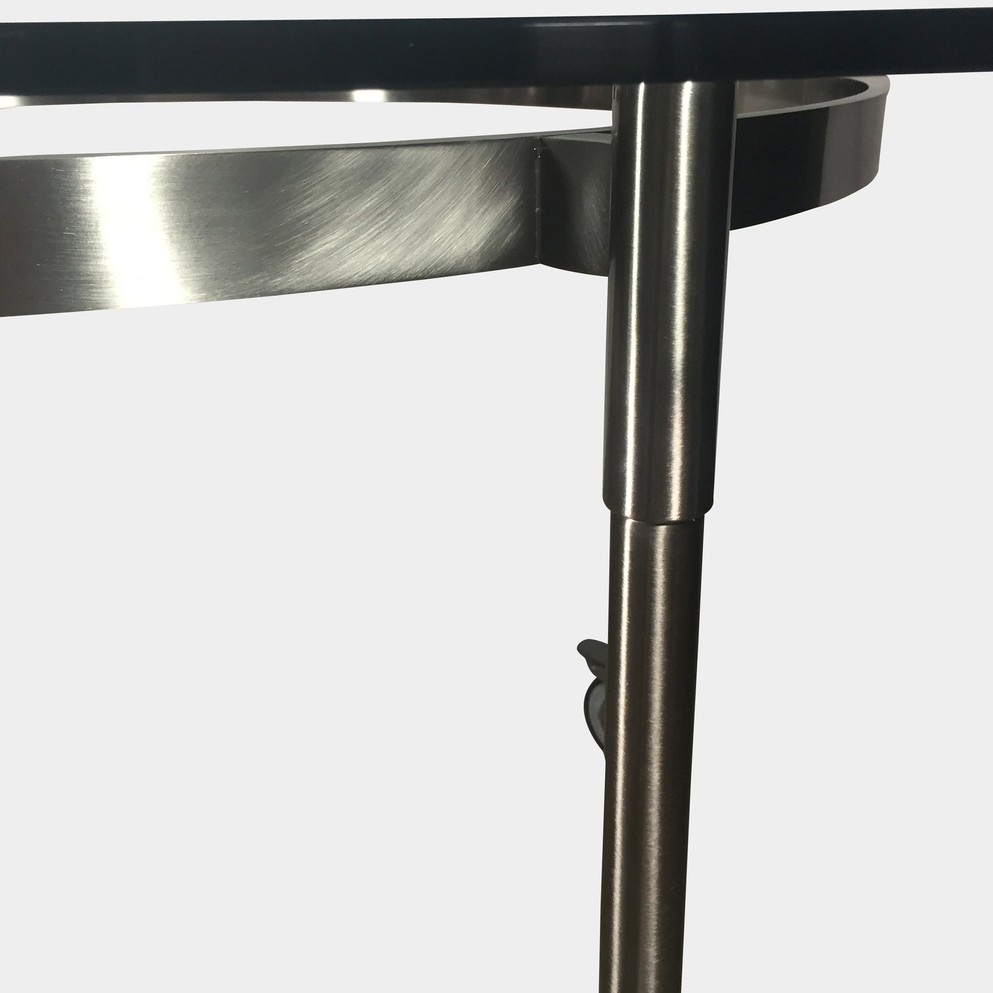 The Driade Ito Dining Table from Driade offers adaptability with its mobile design on wheels, making it easy to move around. It features a chrome base for a sleek and modern look.