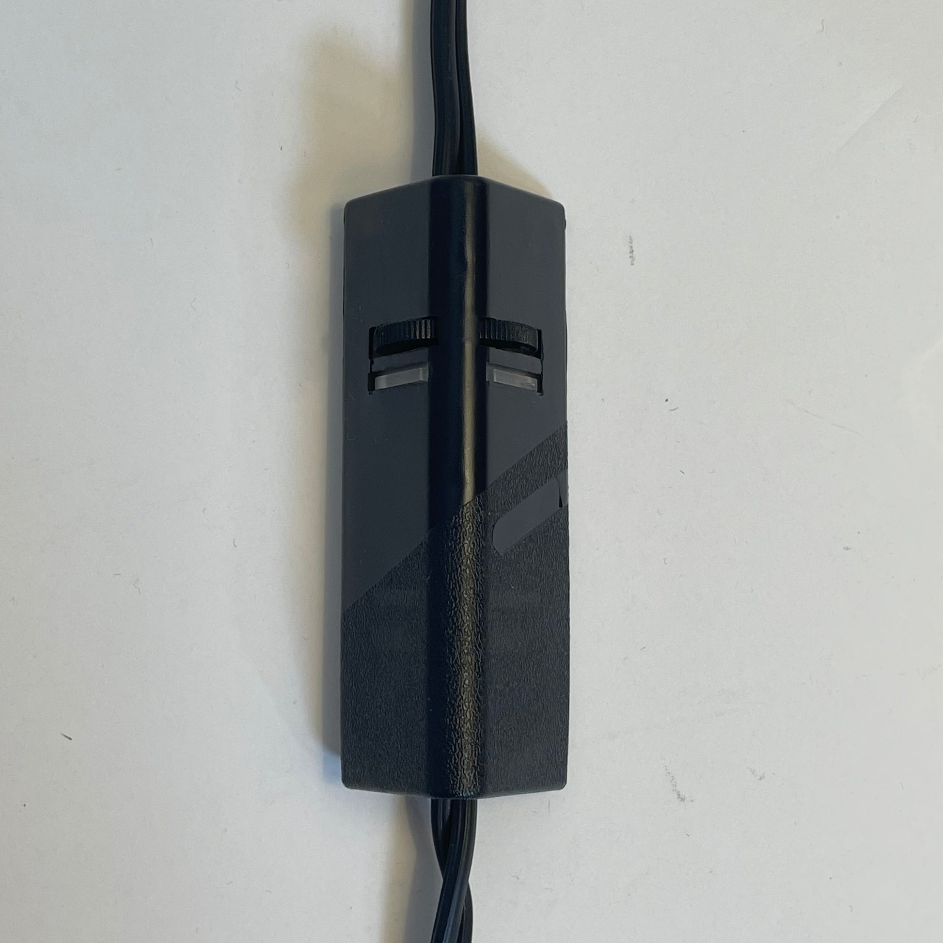 A Venini table lamp with a yellow shade and a black base.