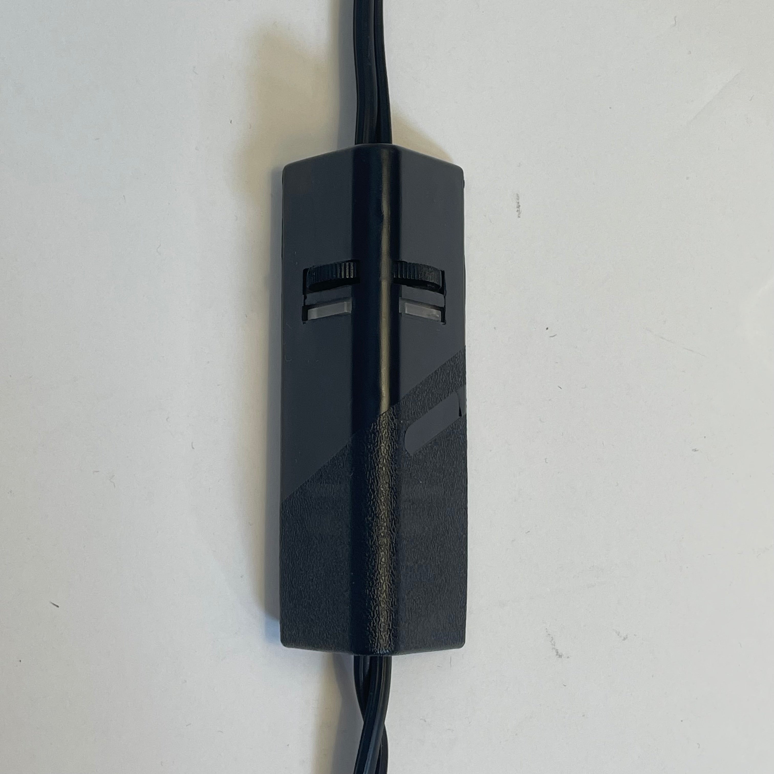 A Venini table lamp with a yellow shade and a black base.