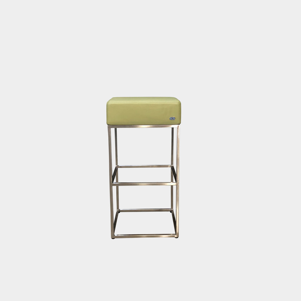 A serious and structured DS-218 Bar Height Stool with a stainless steel base on a white background, made by De Sede.