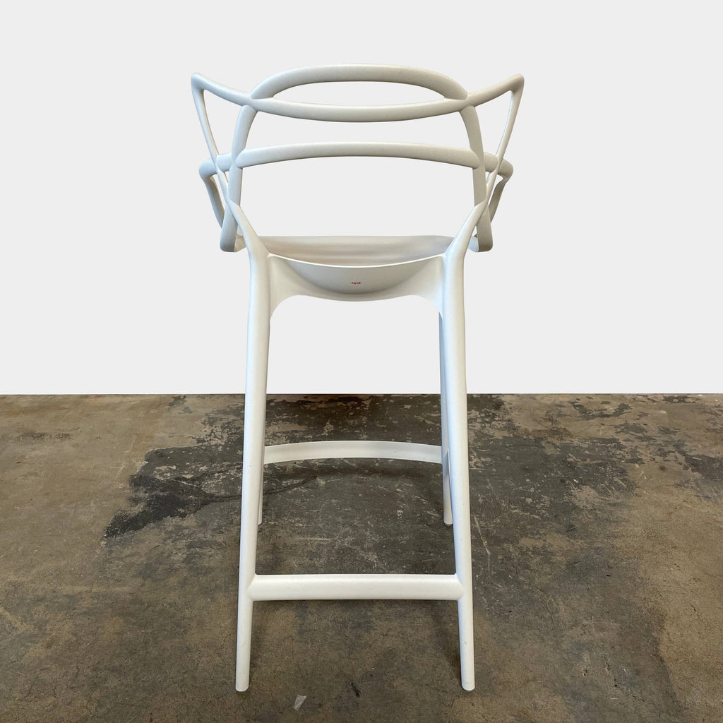 Set of 4 Kartell Masters Bar Height Stools on a white background.