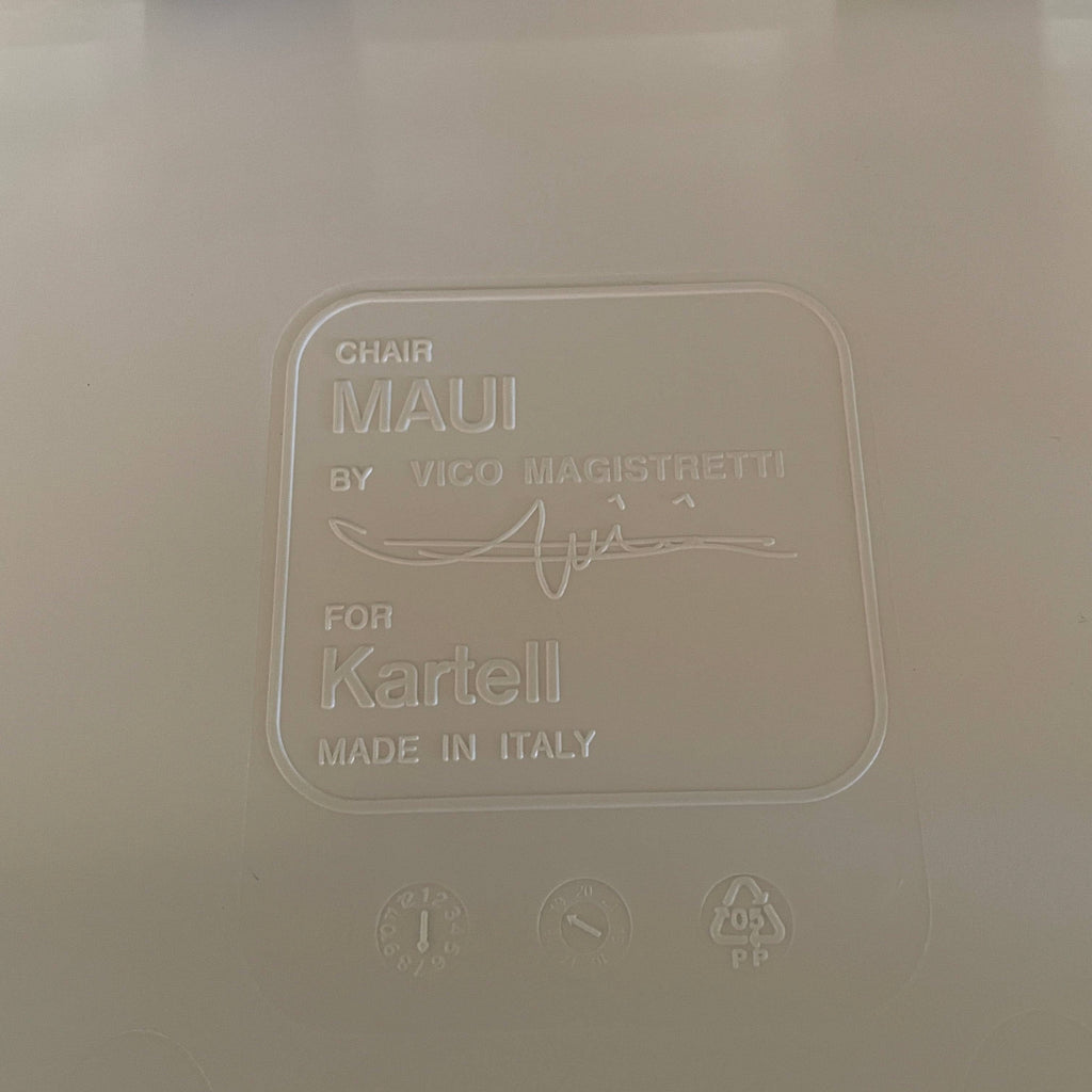 A set of six Kartell Maui Chairs on a white background.