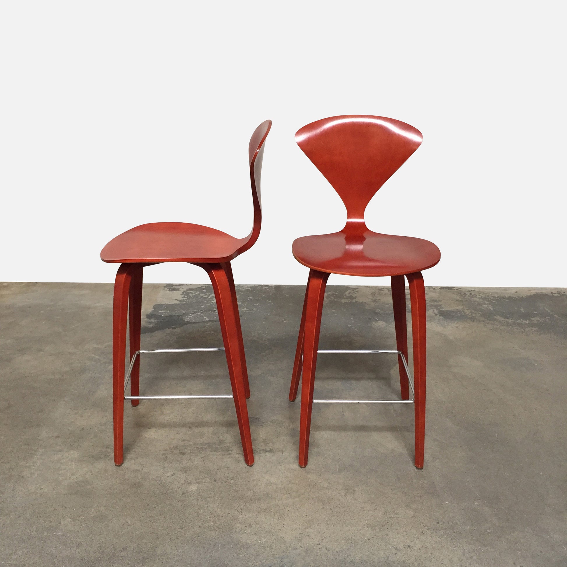 A pair of Cherner Counter Stools on a white background by Cherner Chair Company.