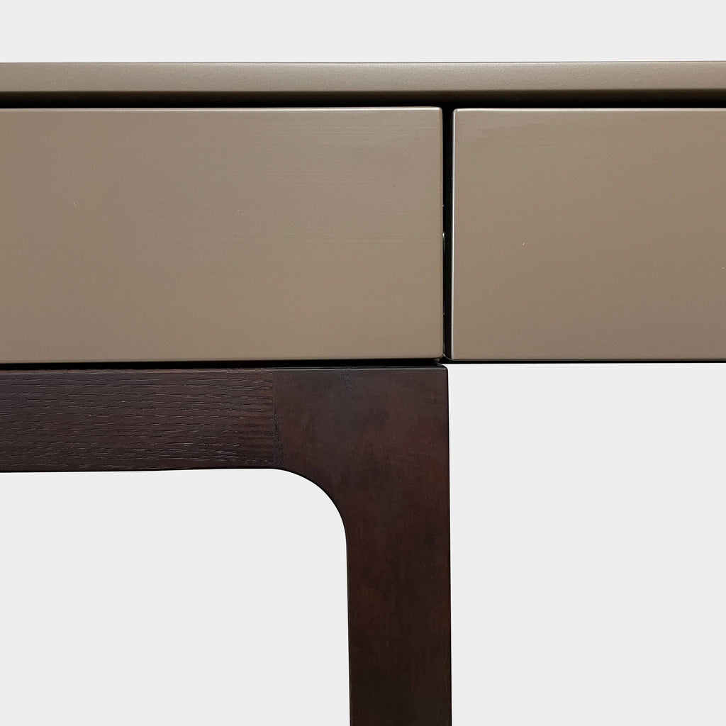 The Lema Victor Desk is a sleek and contemporary addition to any modern office space. Featuring black legs and a glass top, this desk exudes a sense of sleek sophistication. With its clean lines and