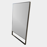 The Maxalto Psiche Leaning Mirror by Maxalto features a large rectangular shape, a slim dark frame, and a minimalist base, shown against a plain white background.
