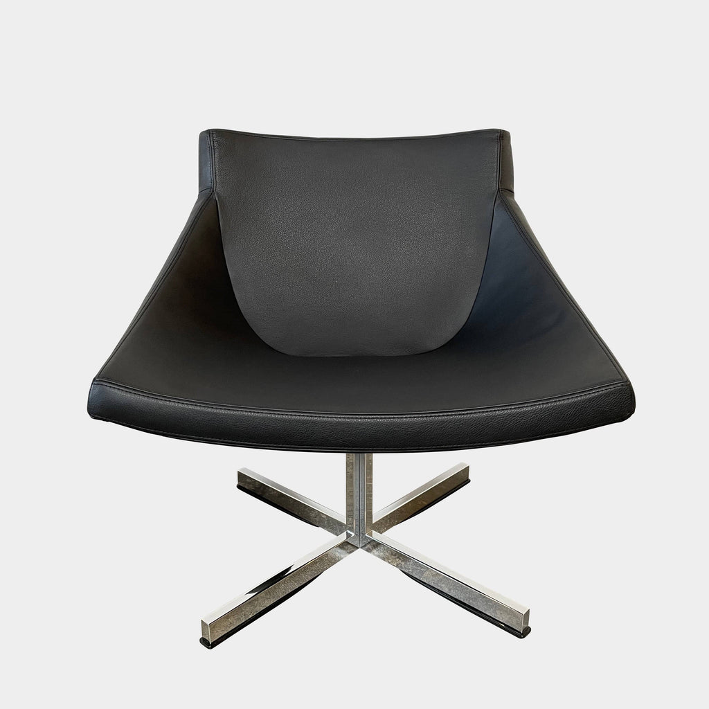 A compact black leather Team by Wellis Bocu Swivel Chair with a chrome base.