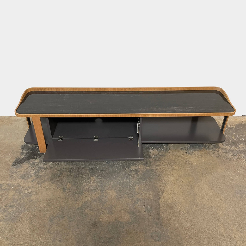 A Ligne Roset Postmoderne TV Cabinet with a wooden shelf.