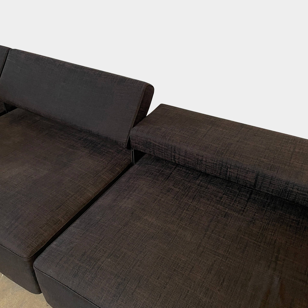 A black B&B Italia Andy Sectional on a white background, perfect for lounging.