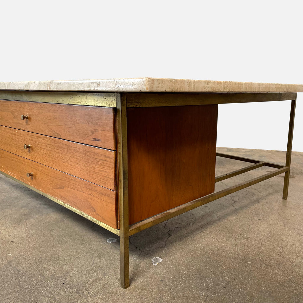 A Calvin Furniture Irwin coffee table with a marble top and metal legs designed by Paul McCobb.
