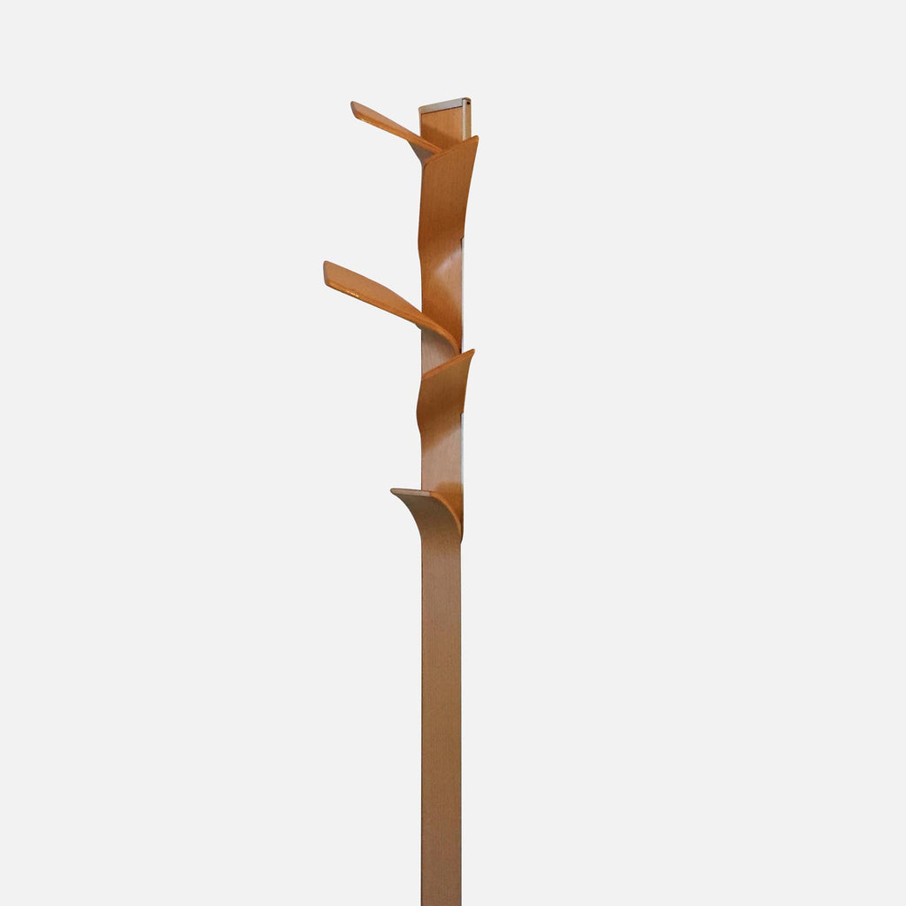 An elegant Punt Mobles ELX Coat Rack mounted on a white background.