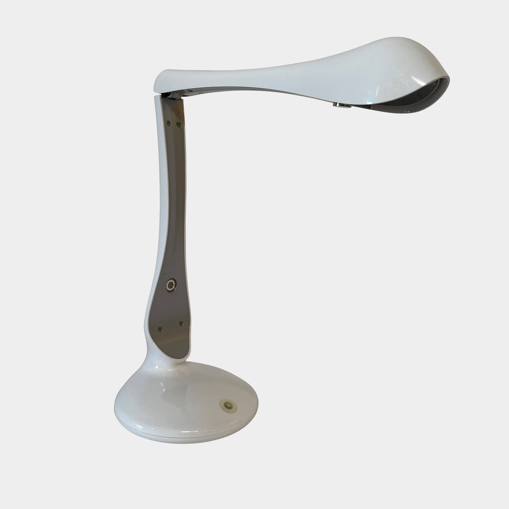 Product description: Yamagiwa Geon Table Lights by Yamagiwa, a table lamp with a metal base.