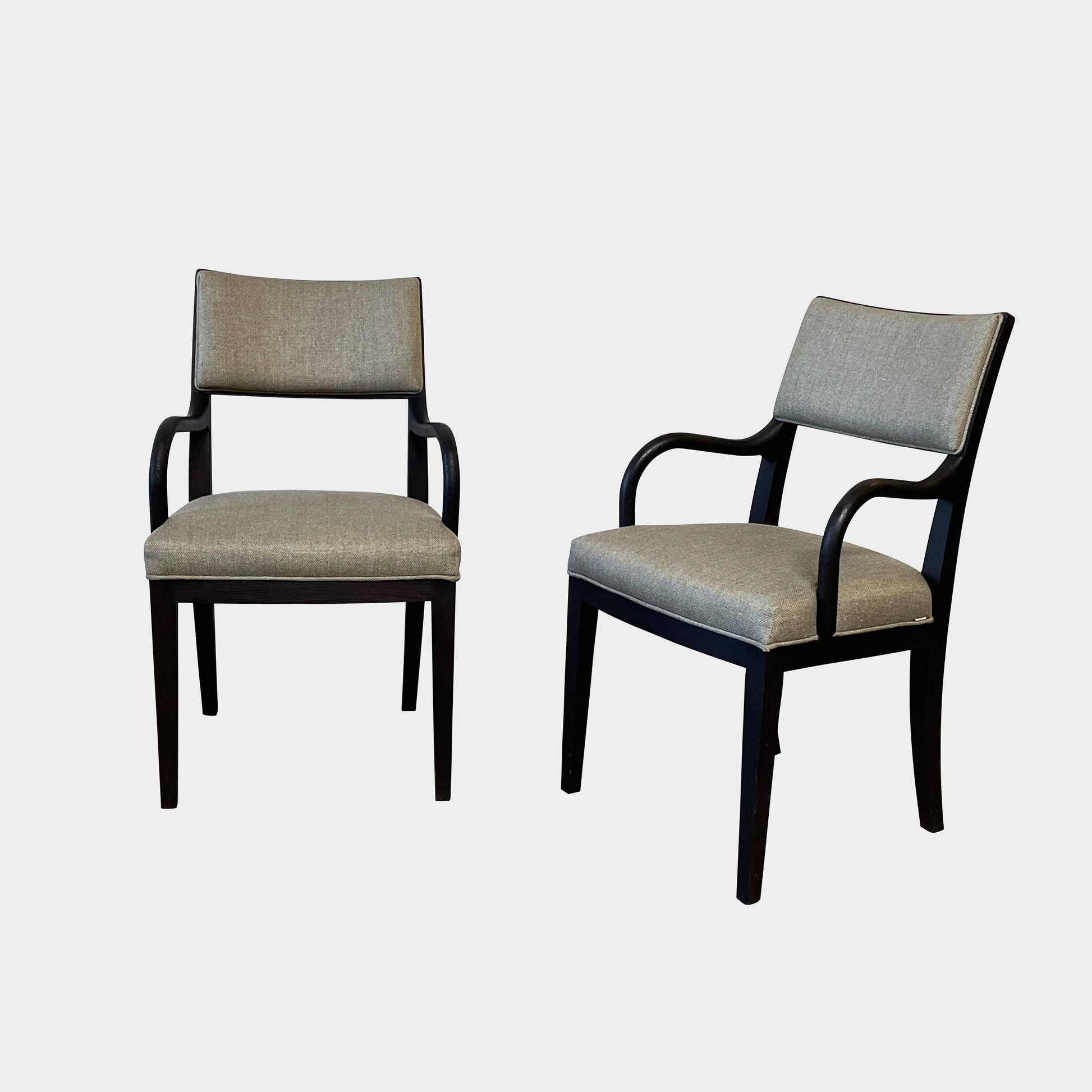 Maxalto Apta Dining Chair Set of 4 by Maxalto features dark wooden frames and light gray upholstered seats and backs, shown in a row against a plain white background.