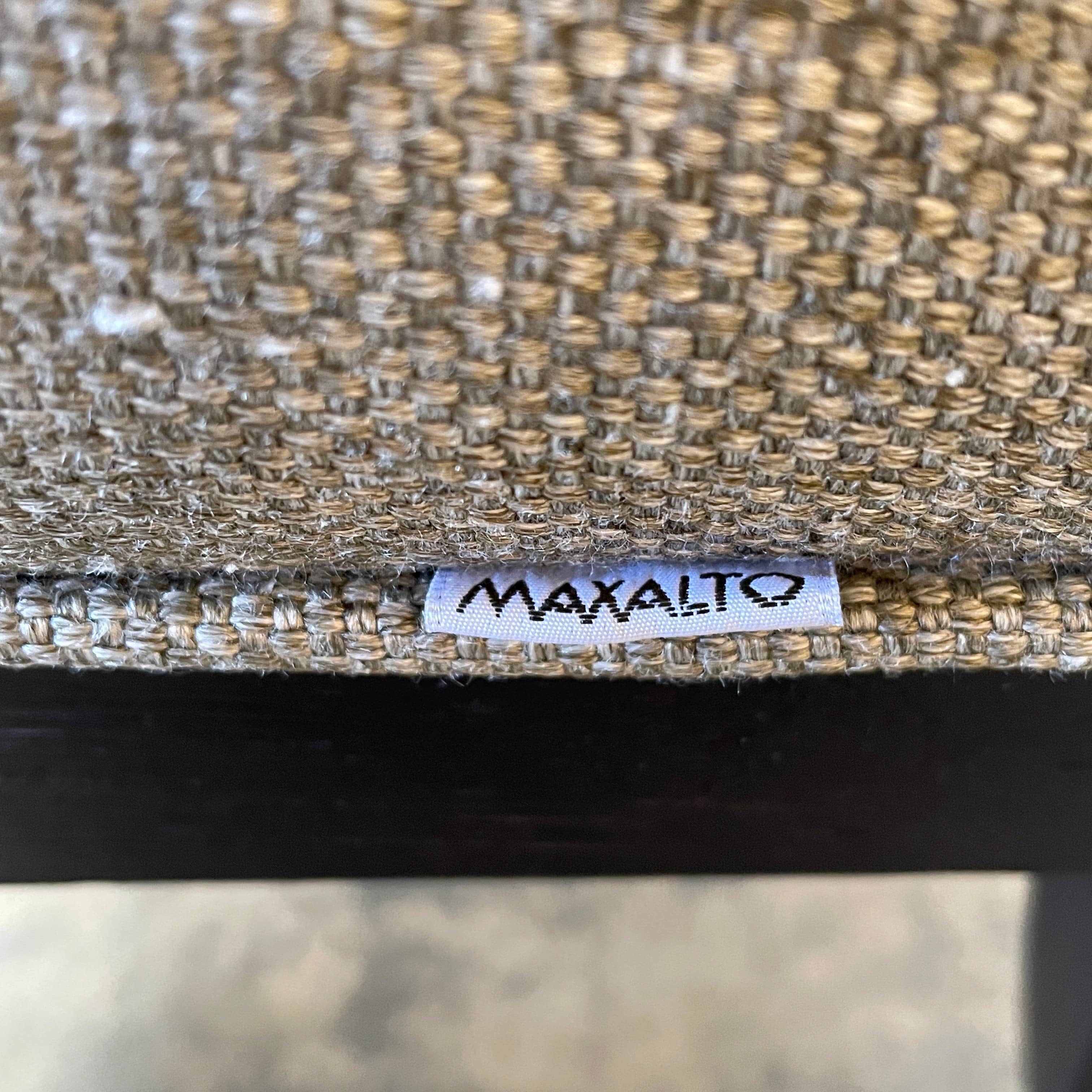 Maxalto Apta Dining Chair Set of 4 by Maxalto features dark wooden frames and light gray upholstered seats and backs, shown in a row against a plain white background.