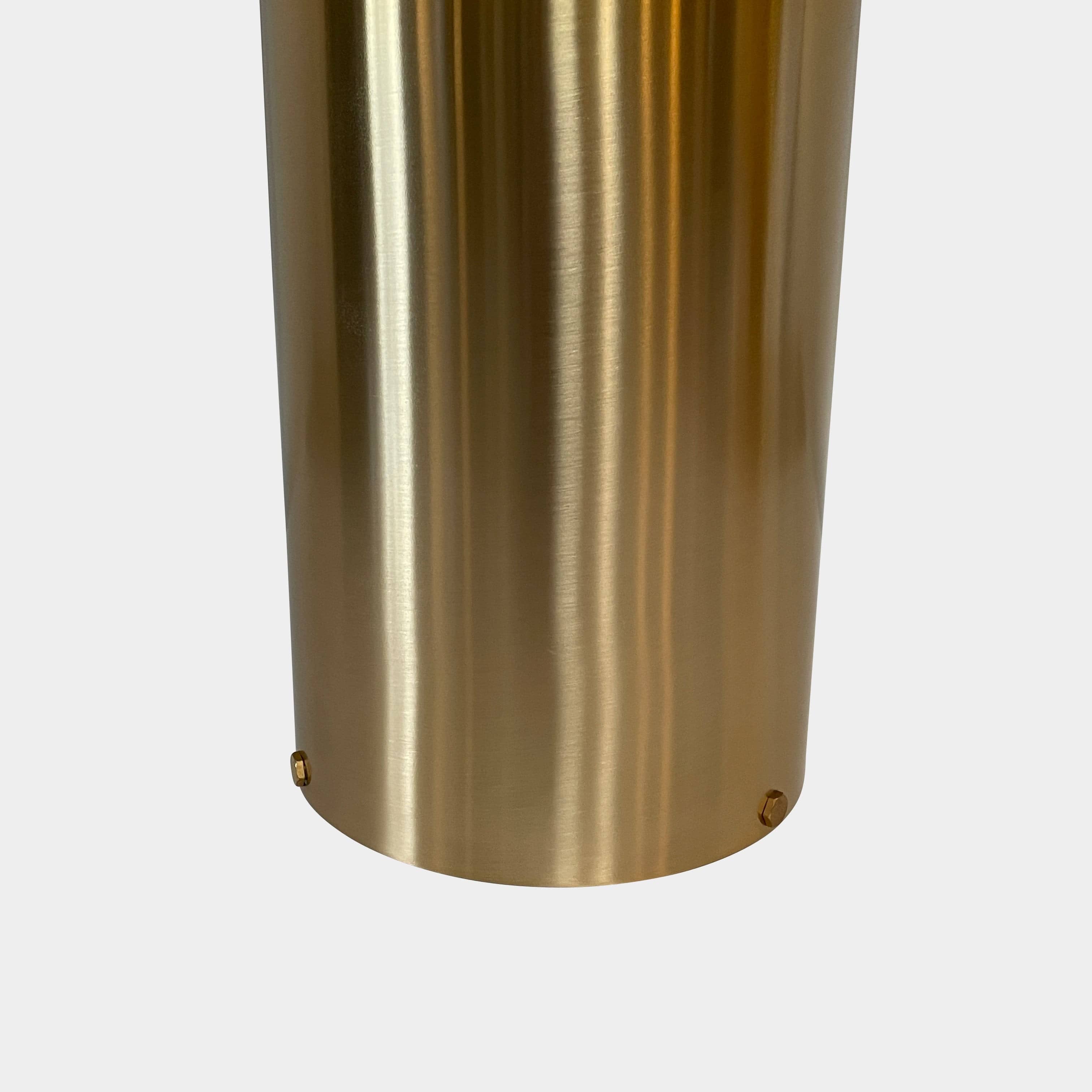 A minimalist Oluce Atolla Metal Table Lamp with a timeless design, showcased on a clean white background.