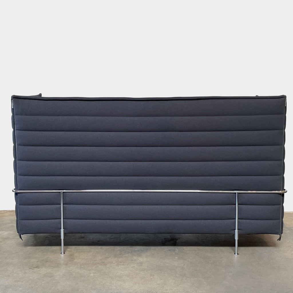 The Vitra Alcove Sofa by Vitra provides comfortable seating with its black cushions and frame.