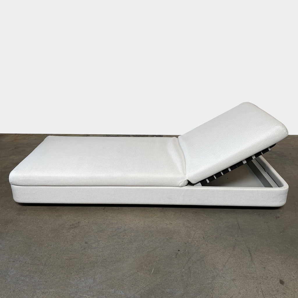 A modern white Paola Lenti Cove Sunbed (THREE ON HOLD) with an adjustable backrest and UV-resistant cushion, set against a plain background. Perfect for outdoor furniture arrangements.