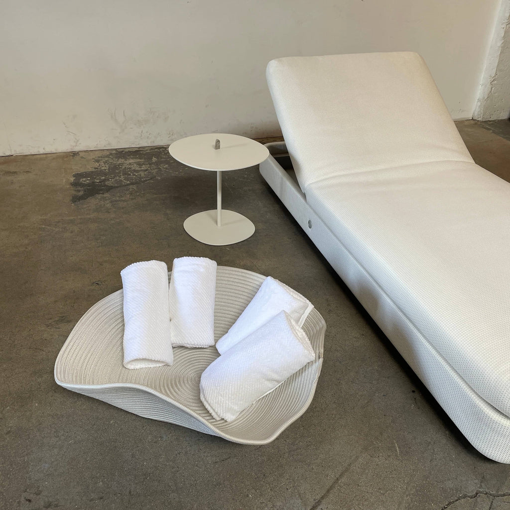 A modern white Paola Lenti Cove Sunbed (THREE ON HOLD) with an adjustable backrest and UV-resistant cushion, set against a plain background. Perfect for outdoor furniture arrangements.