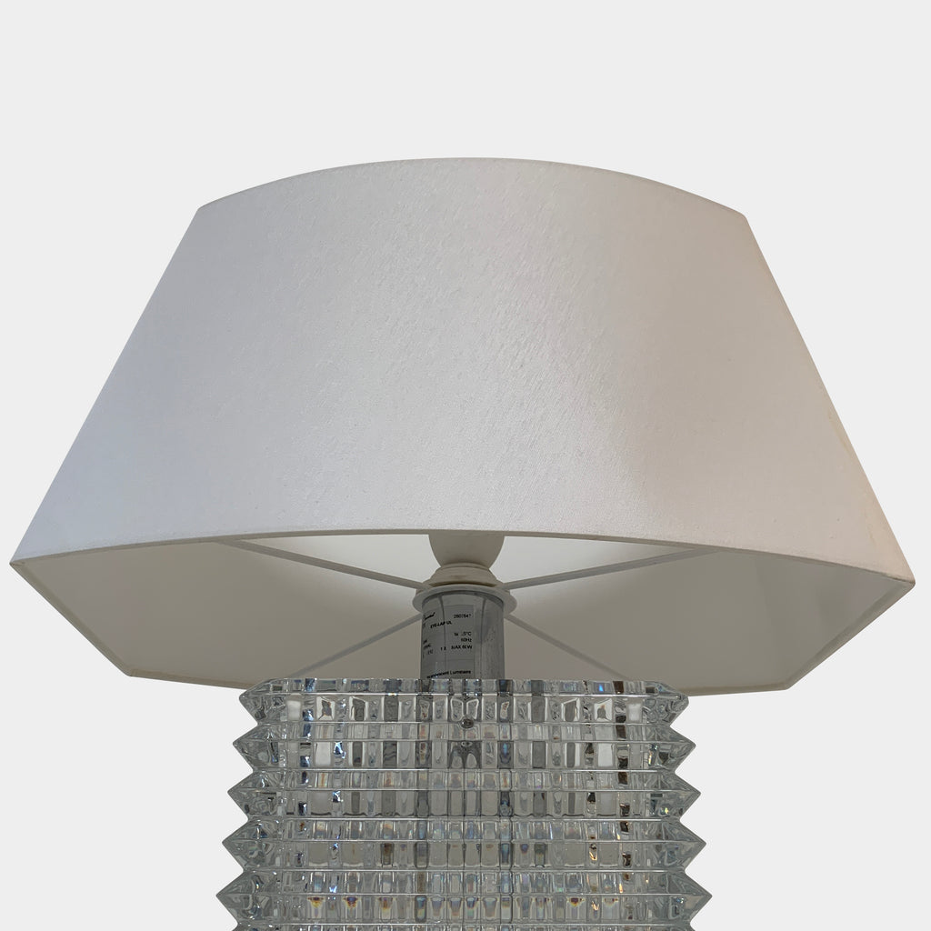 A Baccarat Eye Table Lamp with a white shade by Nicolas Triboulot.