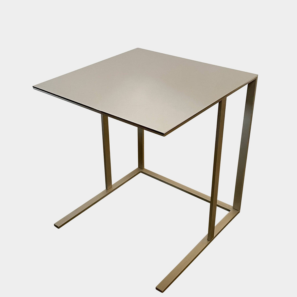 A small B&B Italia Elios Side Table with a metal frame.
