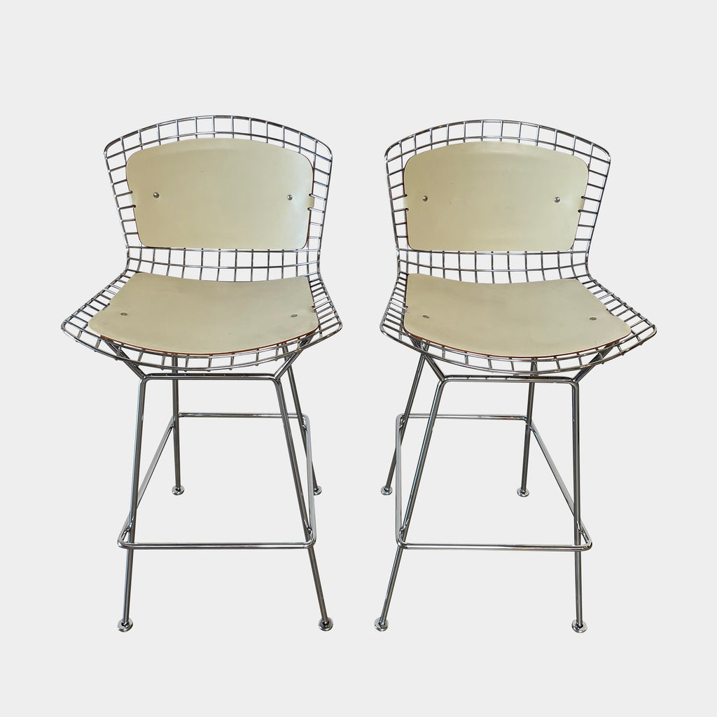 A pair of innovative Bertoia Bar Height Stool Sets by Knoll.