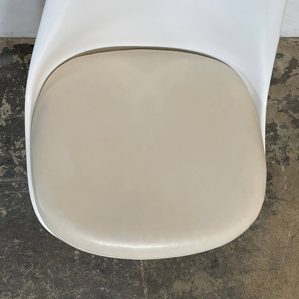 For sale: Knoll Saarinen tulip chair cushions - set of 4. Perfect addition to any dining room setup, this stylish chair does not come with Knoll Saarinen Tulip Chair Cushions - Set of 4 for added comfort.