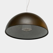 An ornate Flos Skygarden Suspension Light: Matte Rusty Brown pendant light with an interior shade.