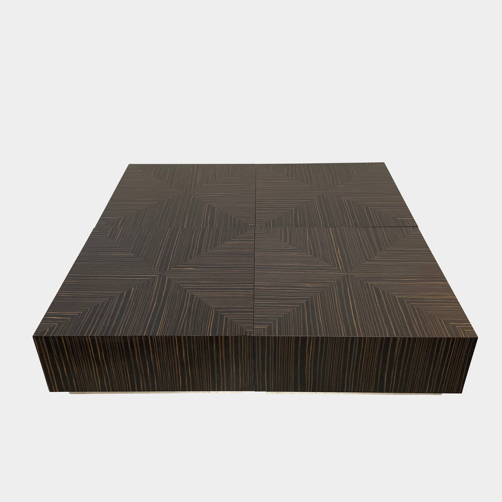 A Minotti Life Coffee Table with a black and white design, featuring zebrawood top and satin steel base.