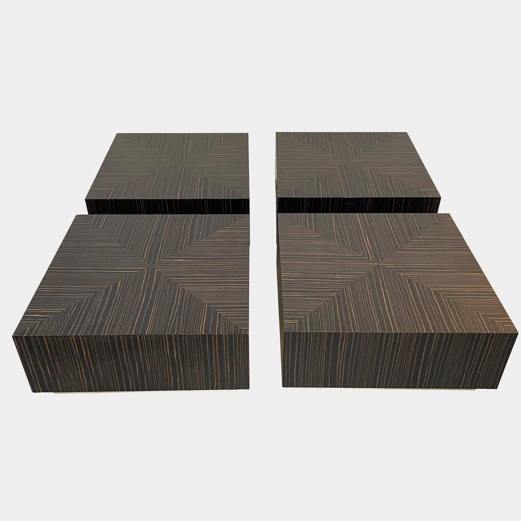 A Minotti Life Coffee Table with a black and white design, featuring zebrawood top and satin steel base.