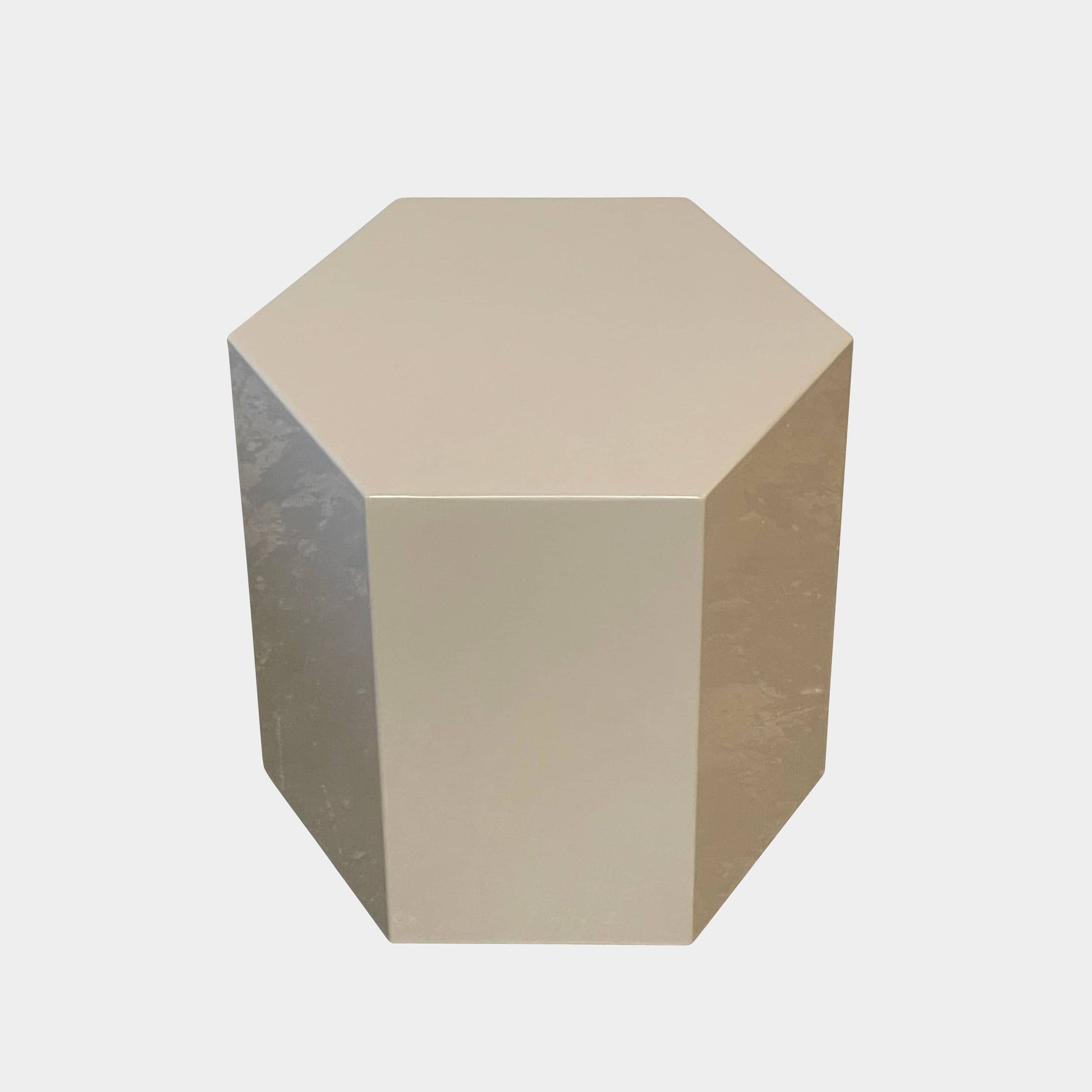 A Minotti Aeron side table on a white background.