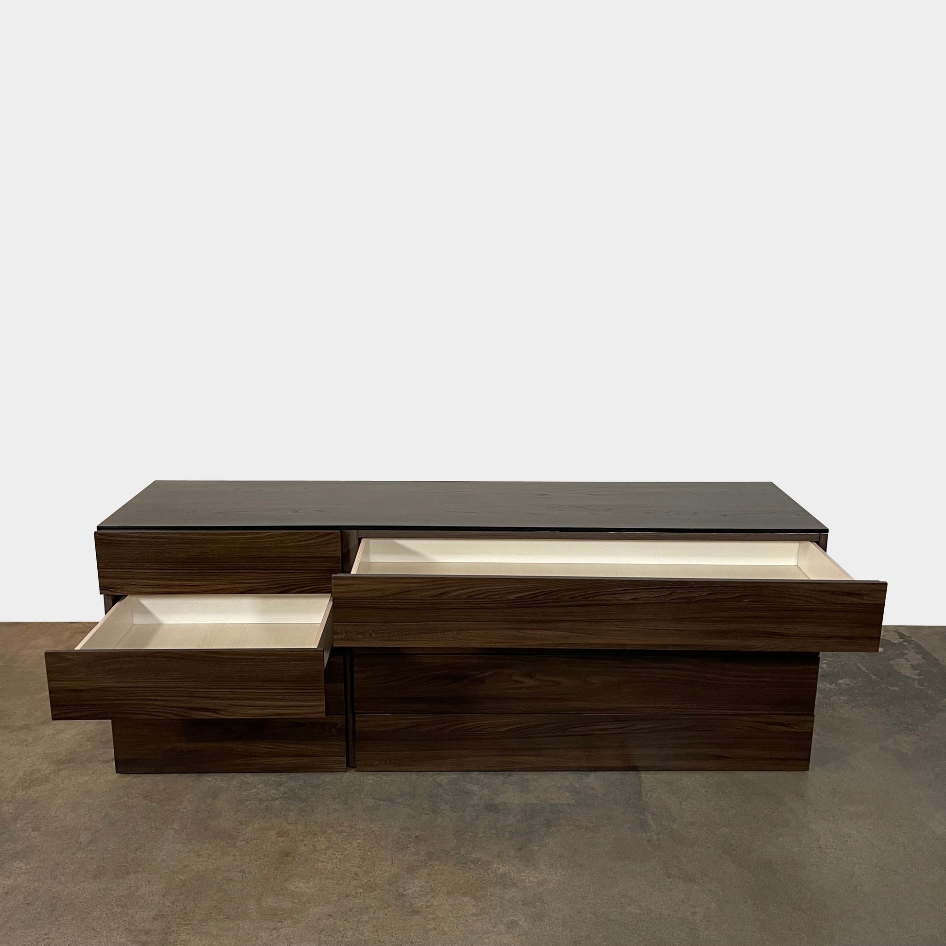 A Dall'Agnese Slim Chest of Drawers with two storage compartments, featuring an oak finish, placed on a white background.