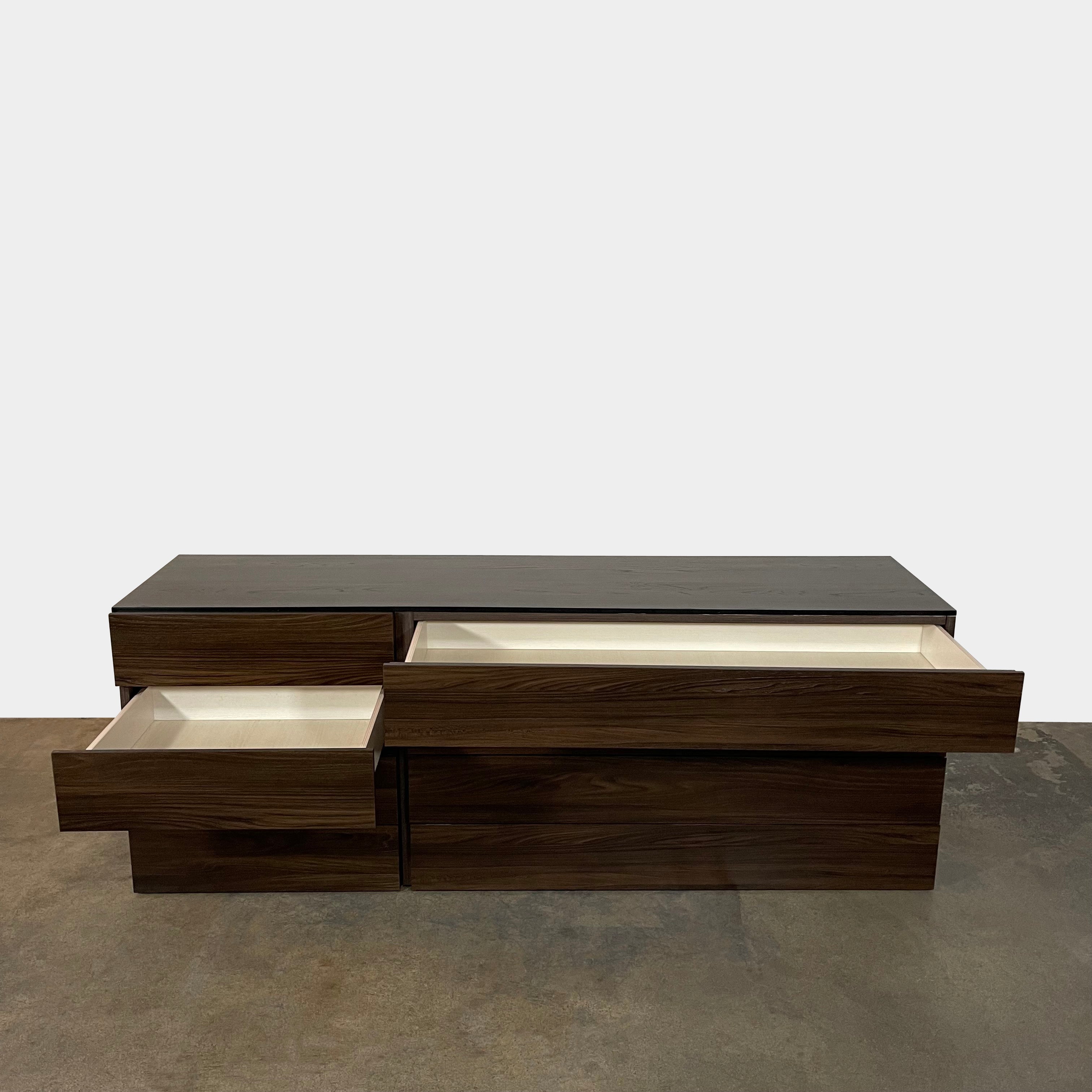 A Dall'Agnese Slim Chest of Drawers with two storage compartments, featuring an oak finish, placed on a white background.