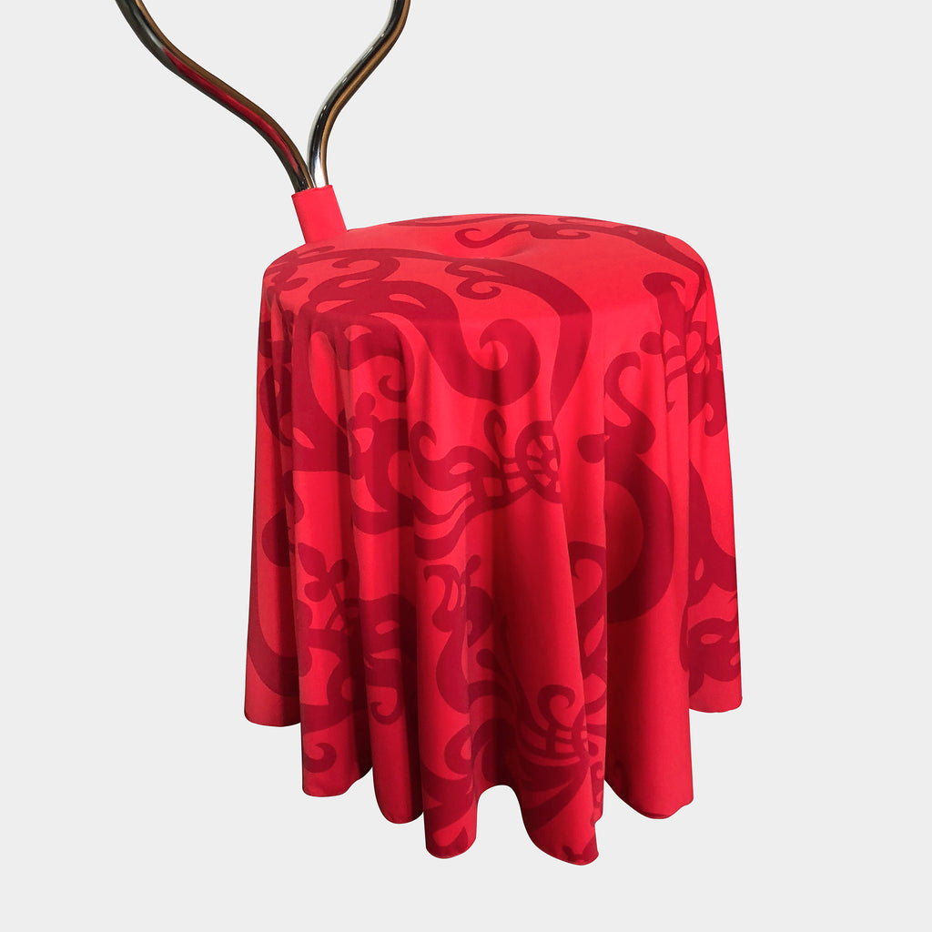 A Cerruti Baleri Red Ballerina Chair on a white background by Marcel Wanders.