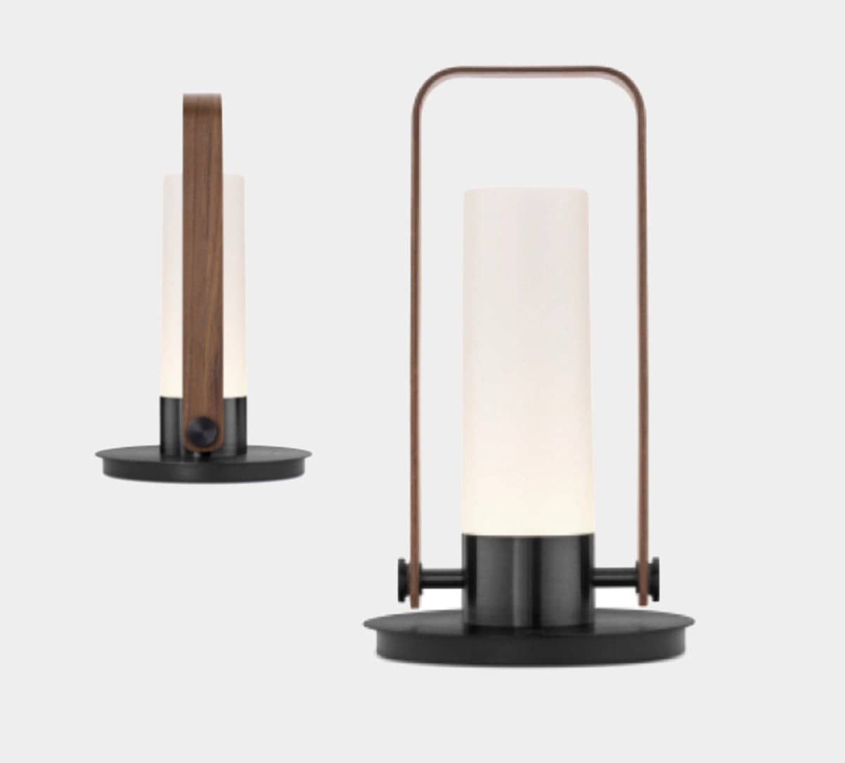 A Luna Lantern Portable Light with a wooden base and a glass cylinder.