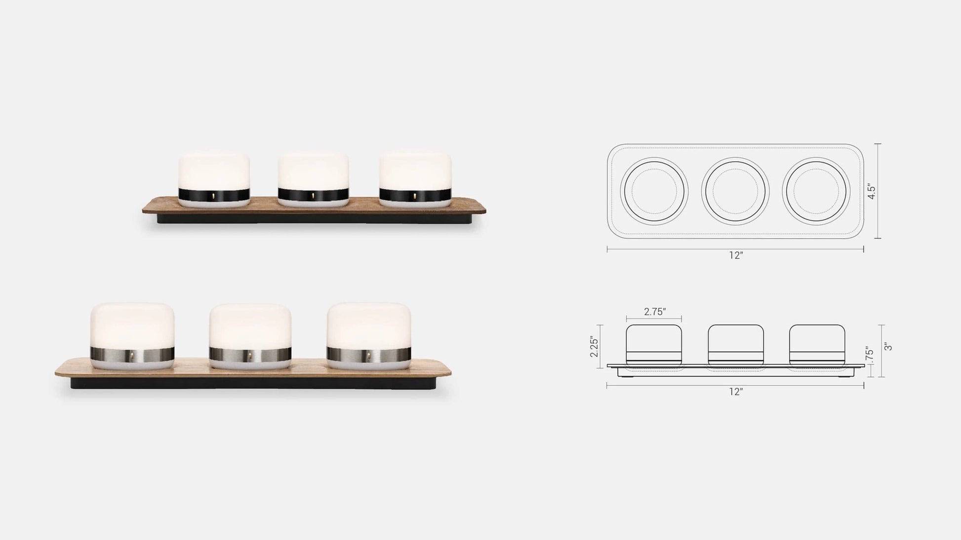 Three Luna Firefly Portable Lights on a wooden stand with a white background.